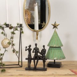 Sort La Vida skulptur af tre musikere p� en b�nk, der spiller violin, guitar og harmonika.