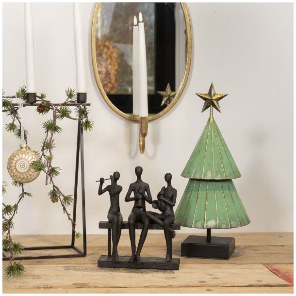 Sort La Vida skulptur af tre musikere p� en b�nk, der spiller violin, guitar og harmonika.