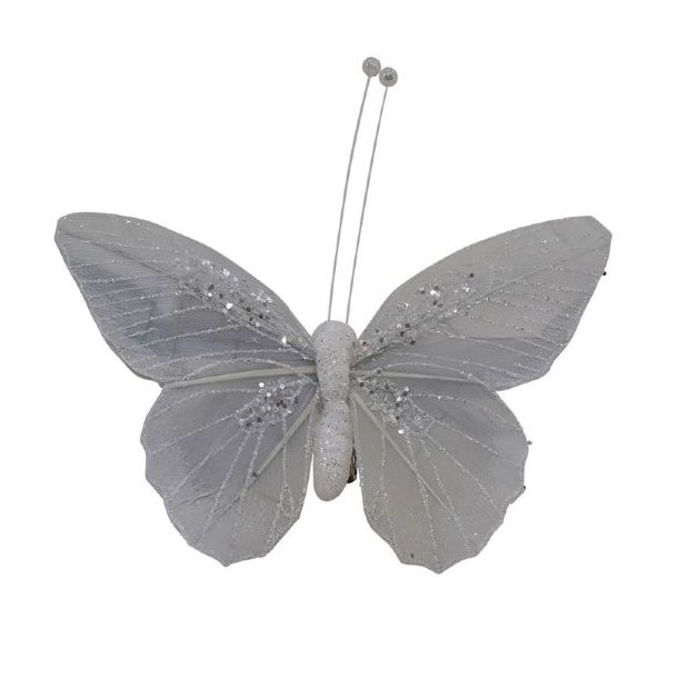 Gr�bl� dekorationssommerfugl i polystyren-fjer med glimmer, fritlagt p� hvid baggrund.