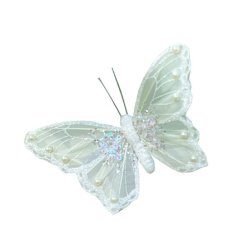 Lysegr�n dekorationssommerfugl i polystyren-fjer med pailletter og perler, fritlagt p� hvid baggrund.