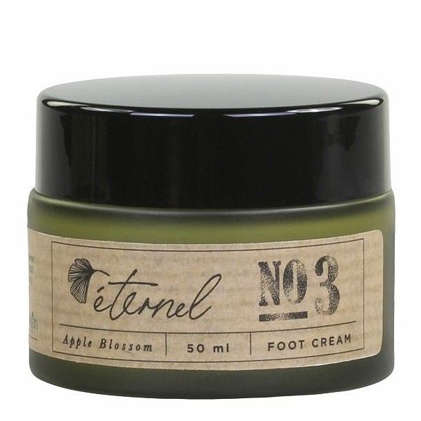 En elegant m�rk krukke med Eternel Fodcreme No. 3 Apple Blossom, vist p� en neutral baggrund.