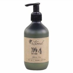 En stilren m�rkegr�n flakon med 250 ml Eternel H�ndlotion No. 4 White Tea og sort pumpe, vist p� hvid baggrund.