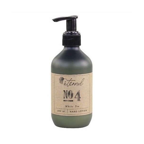 En stilren m�rkegr�n flakon med 250 ml Eternel H�ndlotion No. 4 White Tea og sort pumpe, vist p� hvid baggrund.