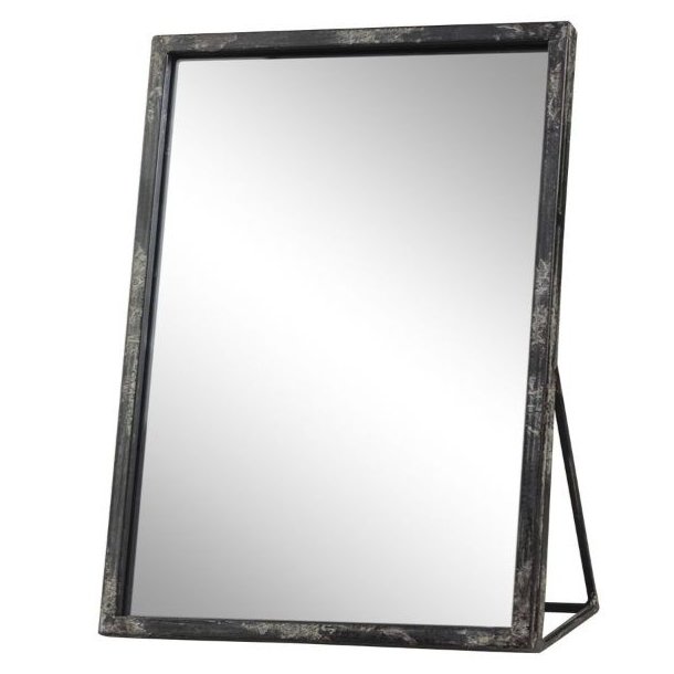 Rektangul�rt spejl i jernramme med sort antique patina og praktisk st�ttefod.