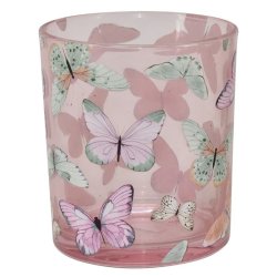 Fritlagt billede af den store model af fyrfadsstagen i rosa glas med hvidt sommerfugleprint.