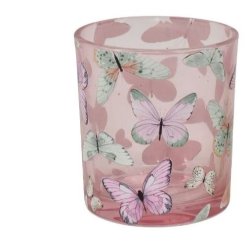 Fritlagt billede af den lille model af fyrfadsstagen i rosa glas med hvidt sommerfugleprint.