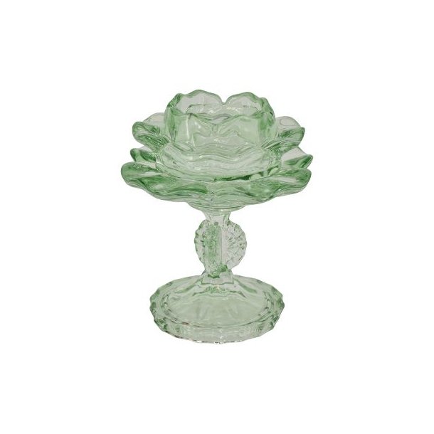 groen-fyrfadsstage-glas-stilket-blomst En fritlagt rund fyrfadsstage i m�nstret gennemsigtigt gr�nt glas, formet som en fin blomst h�vet p� en lille, elegant glasstilk med en rund fod.
