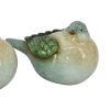 En tyk keramikfugl med gr�nne vinger og bl�lig krop, der kigger let til siden. St�rrelse: H13 / L20 cm.