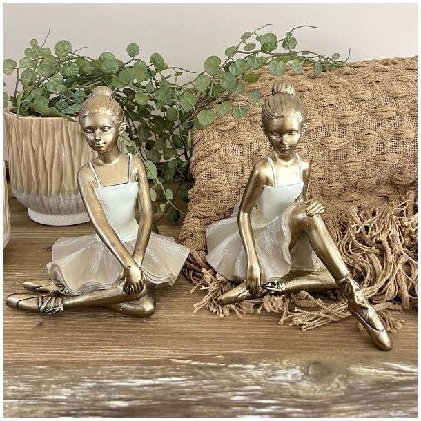 La Vida ballerina figur med hvid kjole og sandfarvet strutsk�rt i polyresin, h�jde 17 cm.