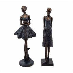 Gyldne ballerinafigur med flot m�rkebl� kjoler i en graci�s dansepositioner