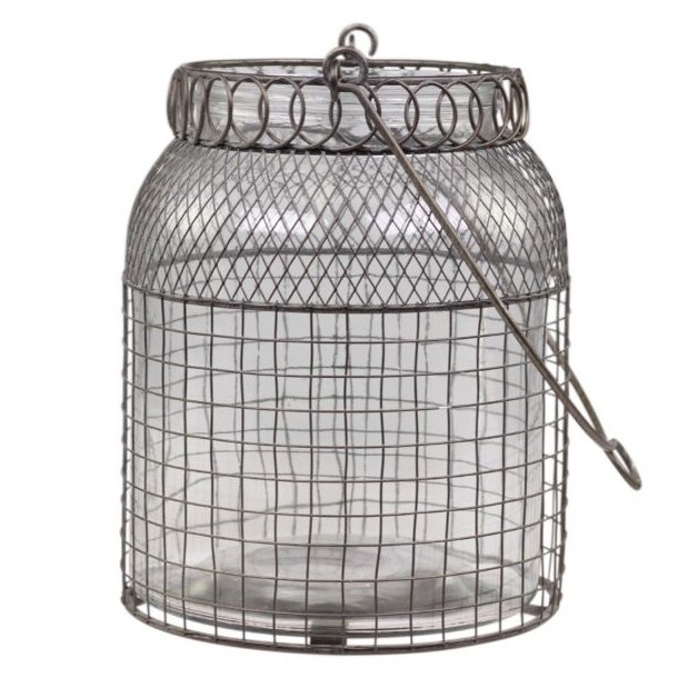 En stor Fil de Fer lanterne i patineret jern med klart glas og hank. Den st�r p� en hvid baggrund.