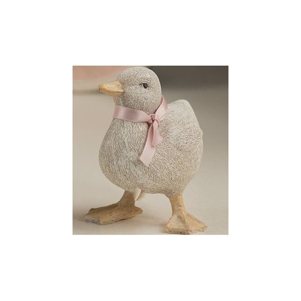 Lille dekorativ p�ske�lling i creme hvid med lyser�d sl�jfe og detaljeret overflade p� 9 cm.