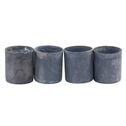 Fritlagt produktbillede af fire sm� runde magnetiske lysholdere i antique zink opstillet p� r�kke p� hvid baggrund.
