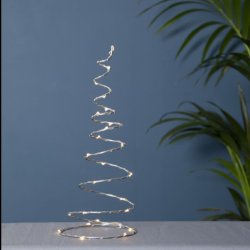 En 40 cm h�j, t�tv�vet lyskegle i s�lvmetal med integrerede LED-lys, placeret som stemningsfuld belysning