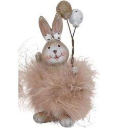 Enkeltst�ende p�skehare med balloner i venstre h�nd og bl�d pelskrave.