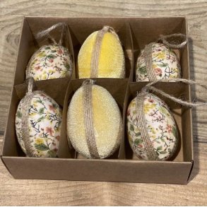 S�t med 6 forskellige p�ske�g i stof med m�nstre i en gave�ske.