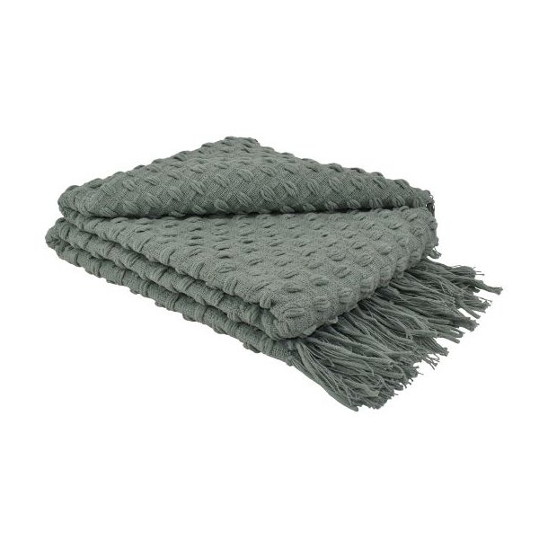 En gr�n m�nstret plaid i bomuldsmix med frynser, der ligger p�nt foldet og viser det taktile reliefm�nster.