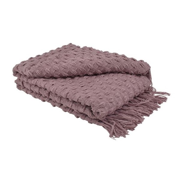 En rosa m�nstret plaid i bomuldsmix med frynser, der ligger p�nt foldet og viser det taktile reliefm�nster.