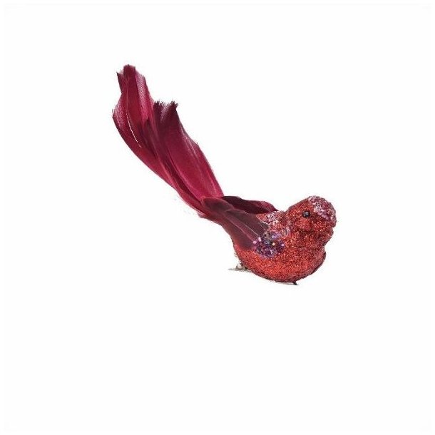 Klassisk r�d dekorationsfugl med funklende glimmer og en lang, elegant fjerhale, fritlagt p� hvid baggrund.