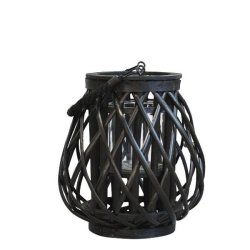 N�rbillede af den lille sorte fletlanterne, der st�r alene p� gulvet.