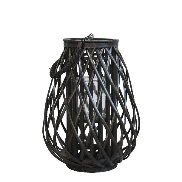 N�rbillede af den mellemste sorte fletlanterne, der st�r alene p� gulvet.