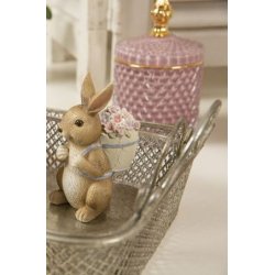 Pskehare med rygsk og blomster